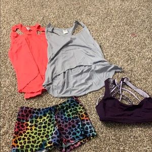 Two shirts, dance bottoms , a sports top
